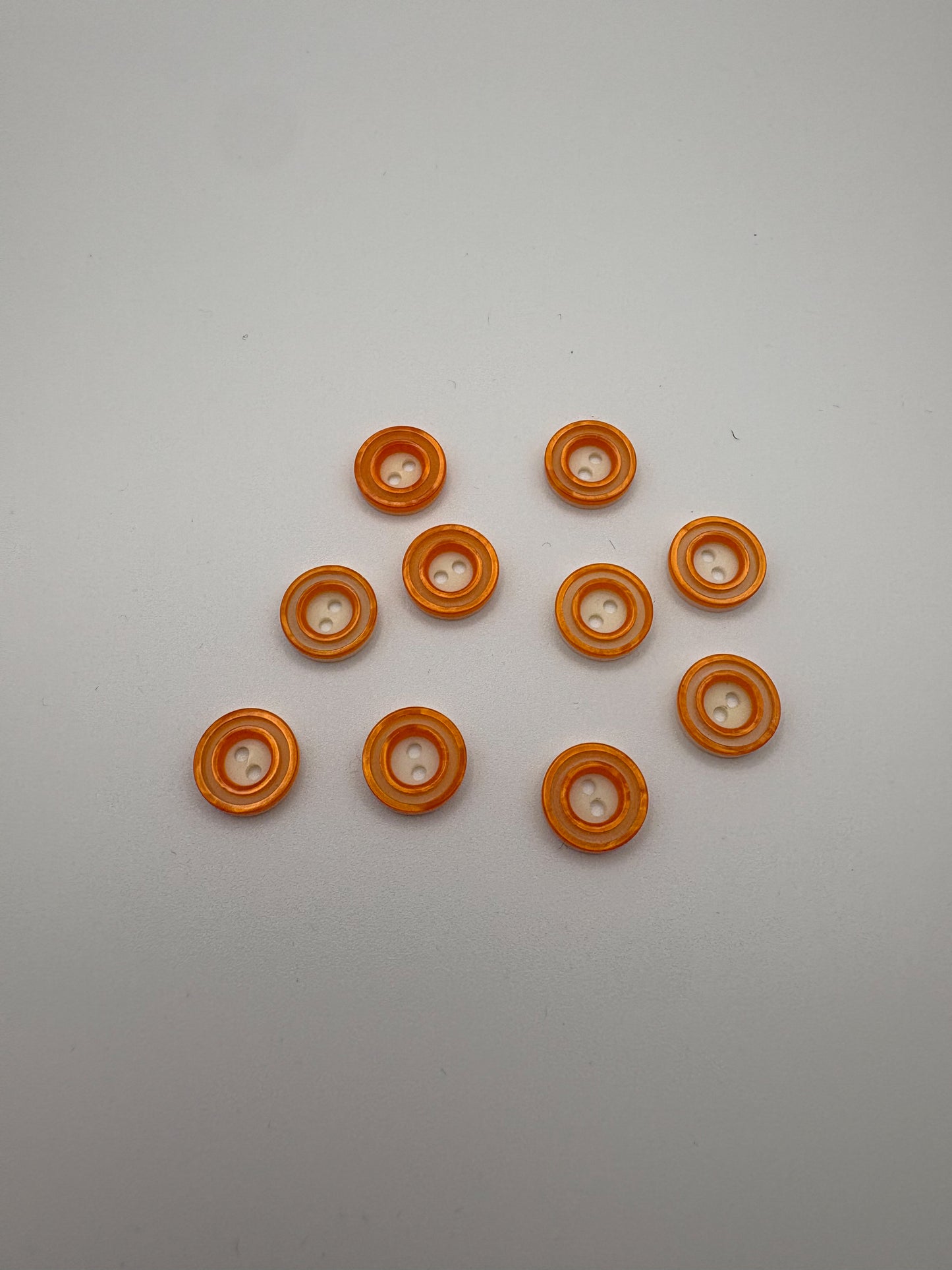 Orange & White Plastic Buttons - 1/2”