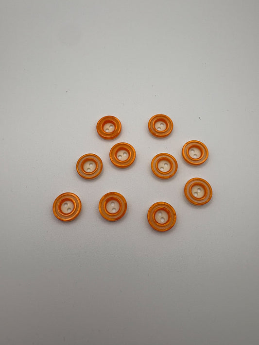 Orange & White Plastic Buttons - 1/2”