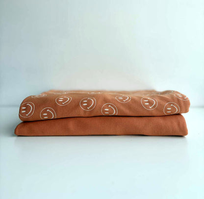 Orange Smilies Soothe Knit Jersey